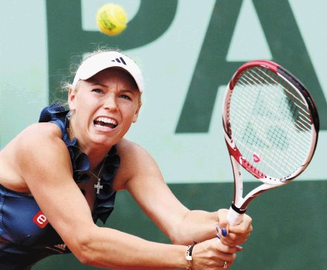 Caroline Wozniacki dijo adiós. Wozniaki sigue sin ganar un torneo de Grand Slam.AP.