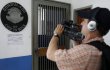 Liberado diplomático de Costa Rica secuestrado en Caracas. Un camarógrafo es visto tomando imágenes de la entrada de la embajada y consulado costarricense en Caracas (Venezuela), ayer. EFE.