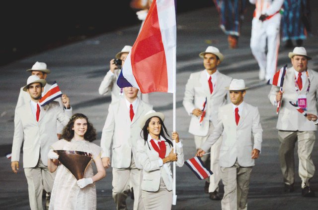  Un cuento de hadas. Los costarricenses disfrutaron a plenitud la inauguración de los Juegos. Algunos se quedaron sin palabras para describir lo que sintieron en el desfile.AFP.