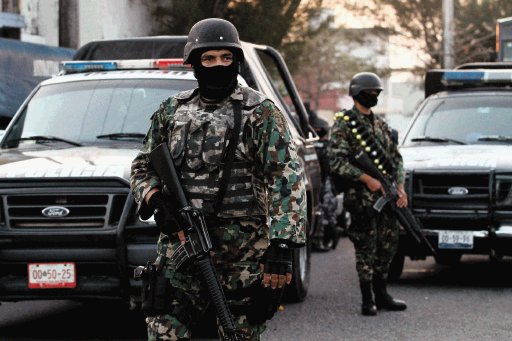 En M&#x00E9;xico, matan 16 en ataques Pistoleros atacan autobuses en Veracruz
