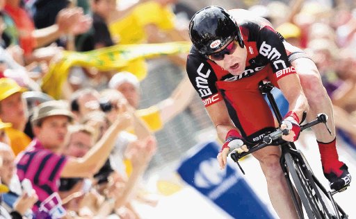  Par&#x00ED;s a los pies de  Cadel Evans  El ciclista australiano es el virtual ganador del Tour de Francia 2011