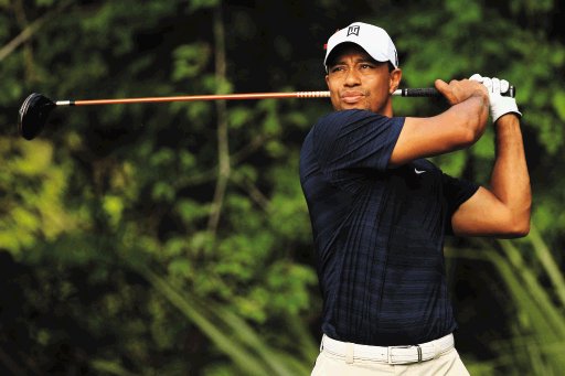 Woods se retira del Players Chamiponship. El golfista manifestó que sus molestias iniciaron con un dolor en la rodilla. AFP.