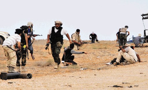  Contin&#x00FA;an los combates en Libia  Intentan controlar la ciudad de Sirte