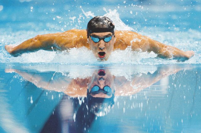 Michael Phelps. El estadounidense Michael Phelps ganó ayer las medalla de oro en los relevos de 4x200 y la plata en los 200 m mariposa. AFP.