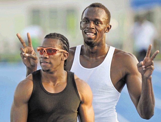  Bolt y Blake por la gloria. Bolt aseguró que para Blake será una buena experiencia ya que competirá contra los mejores del mundo.Archivo.