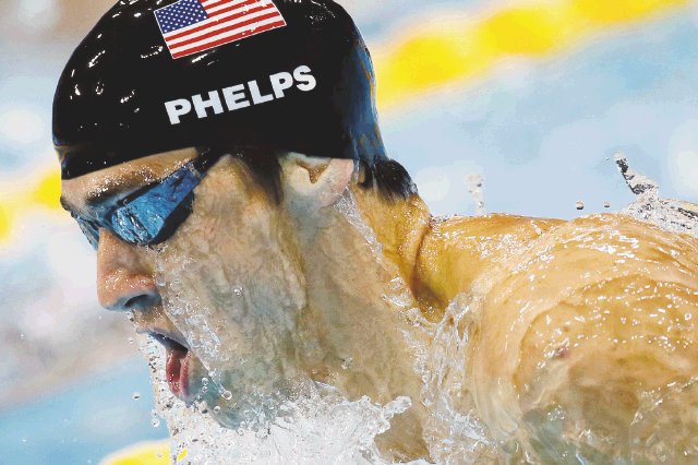 La leyenda de Phelps crece. “Es algo muy especial”, confesó Michael tras su victoria.EFE.