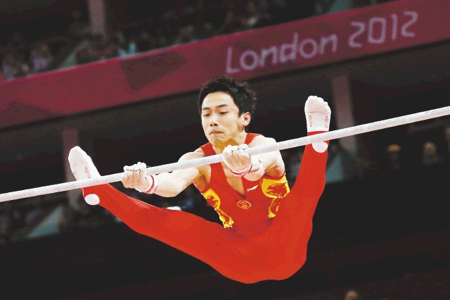  China tiene su imperio. El chino Zou Kai volvió a ser figura de la representación de su país en la gimnasia que se dejó el título de la disciplina.AFP.