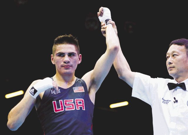 Boxeador con tacos. Ramírez venció en una apretada decisión a un francés y ganó el tercer oro para EE. UU. AFP.
