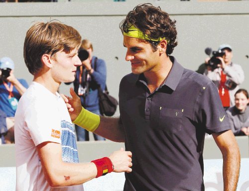 “¡Que se besen,que se besen!”. Goffin y Federer. Vea hoy el torneo por ESPN, de 7 a.m. a 12 m.d. y de 3 p.m. a 5 p.m.AFP.