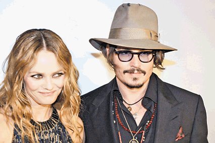 Buena pensión. Vanessa Paradis y Johnny Depp.