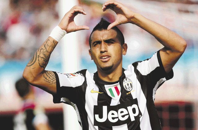  A la “Juve” nadie la puede cazar. Arturo Vidal le dio el triunfo a la Juventus ante el Catania.AFP.