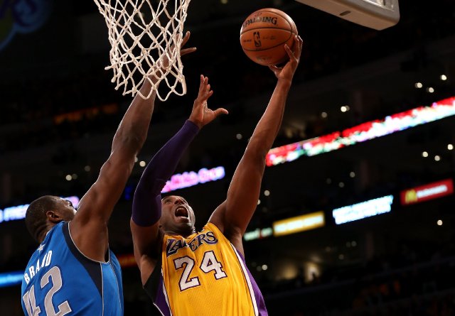 Los Heat juegan como campeones, los Lakers como perdedores. Kobe Bryant aportó 22 puntos. AFP