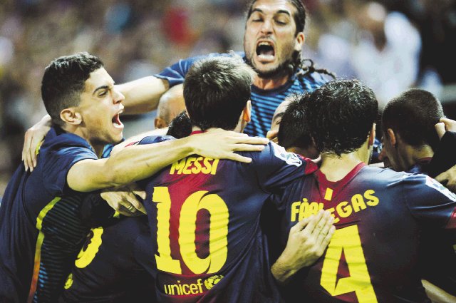 El Barça remonta al Sevilla en un descuento de locura. En los últimos partidos de Liga, el Barcelona ha anotado gol en sus últimos minutos y ya van de seis partidos, seis victorias. Foto: AFP.